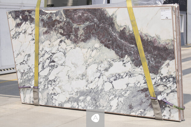 Breccia Capraia Wow marble slab with white ground broken by violet and burgundy breccia and grey veining, polished