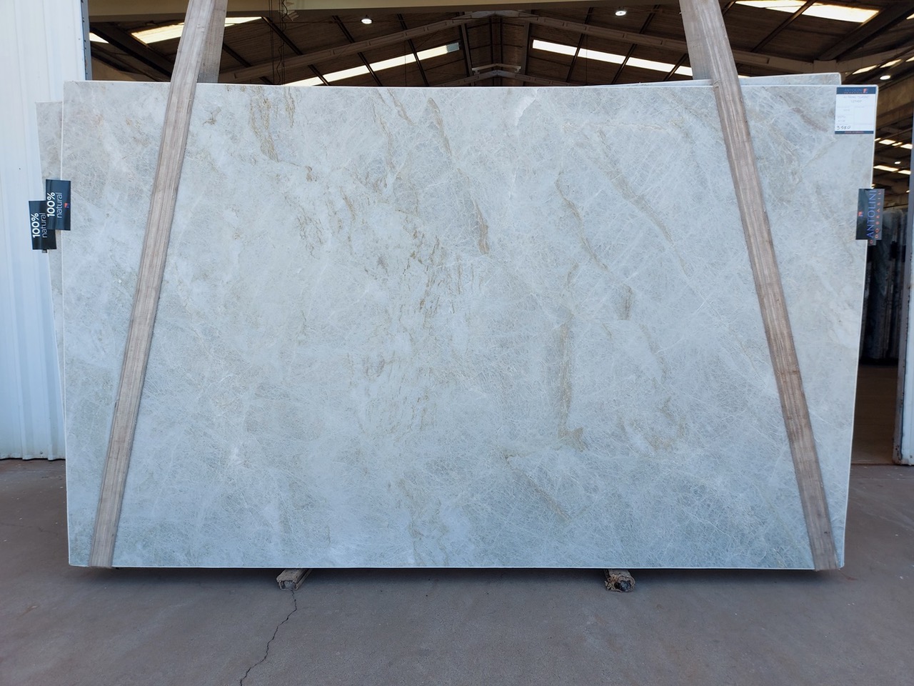 Antolini Taj Mahal Classic quartzite slab with quiet cream field and soft warm undertones, polished