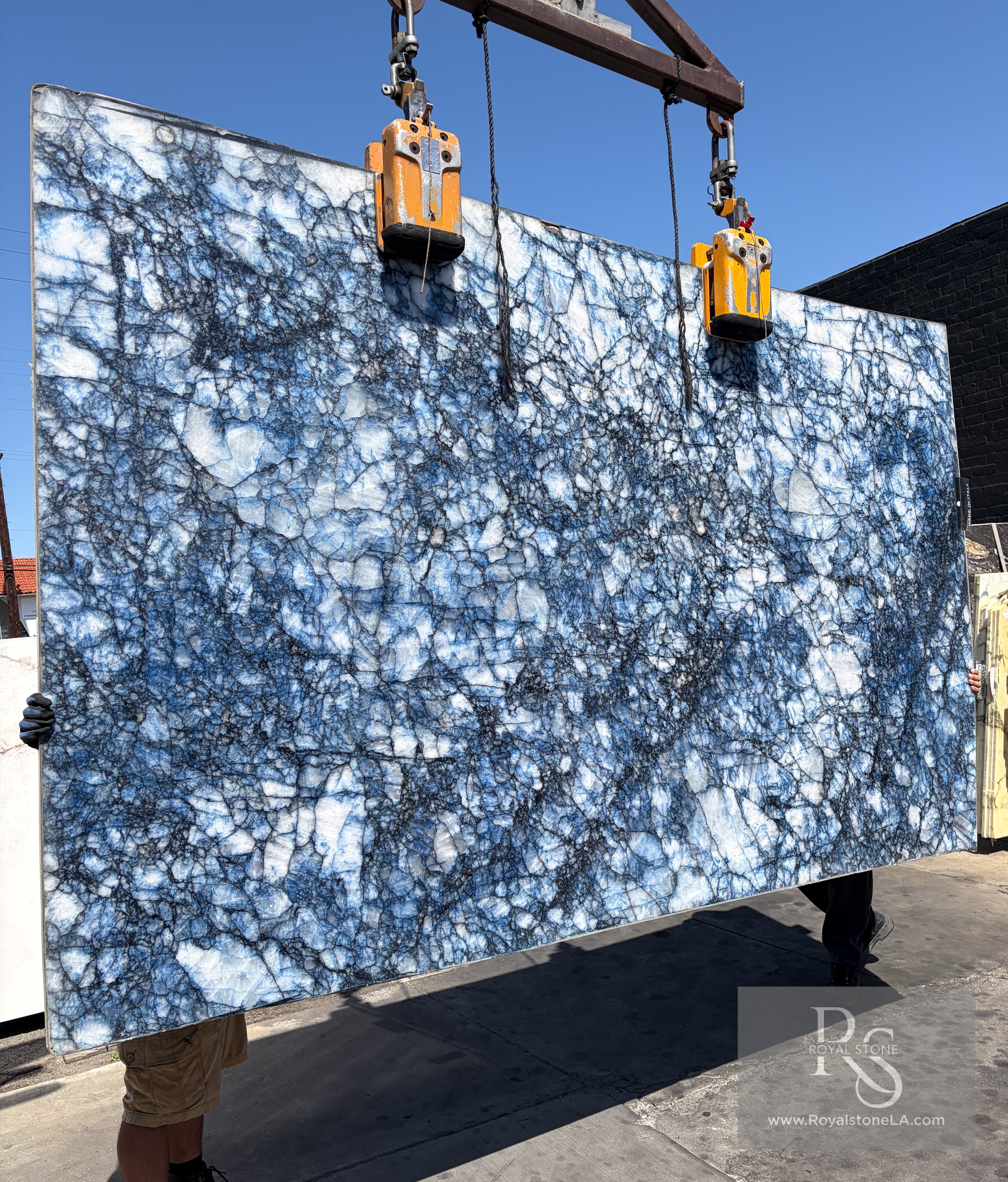 Antolini Borghini Calacatta Gold honed marble slab at Royal Stone, white field with thick painterly gold veining
