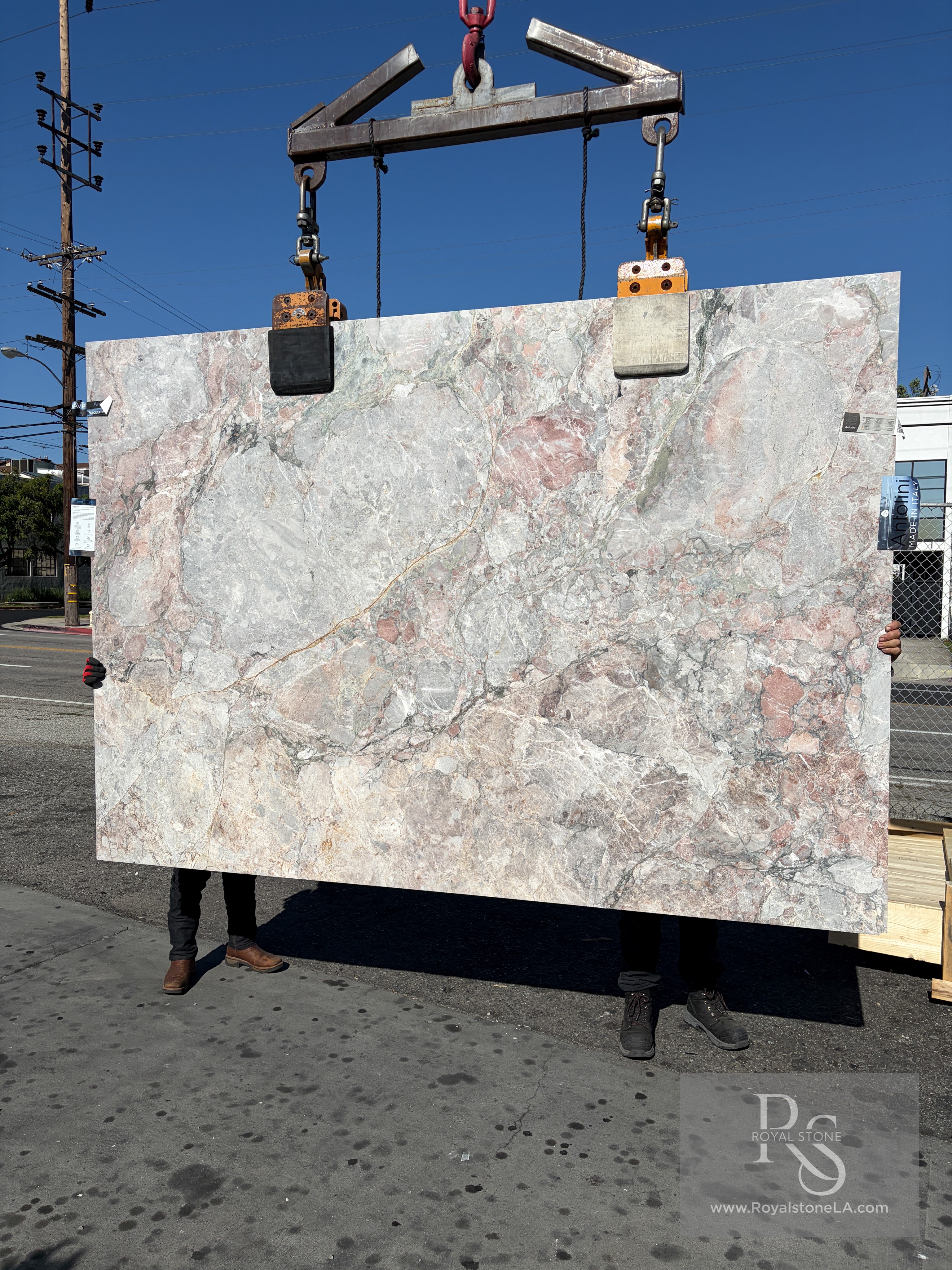 Antolini Les Quatre Saisons honed pink marble slab at Royal Stone, ivory field with soft blush and fine gray veining