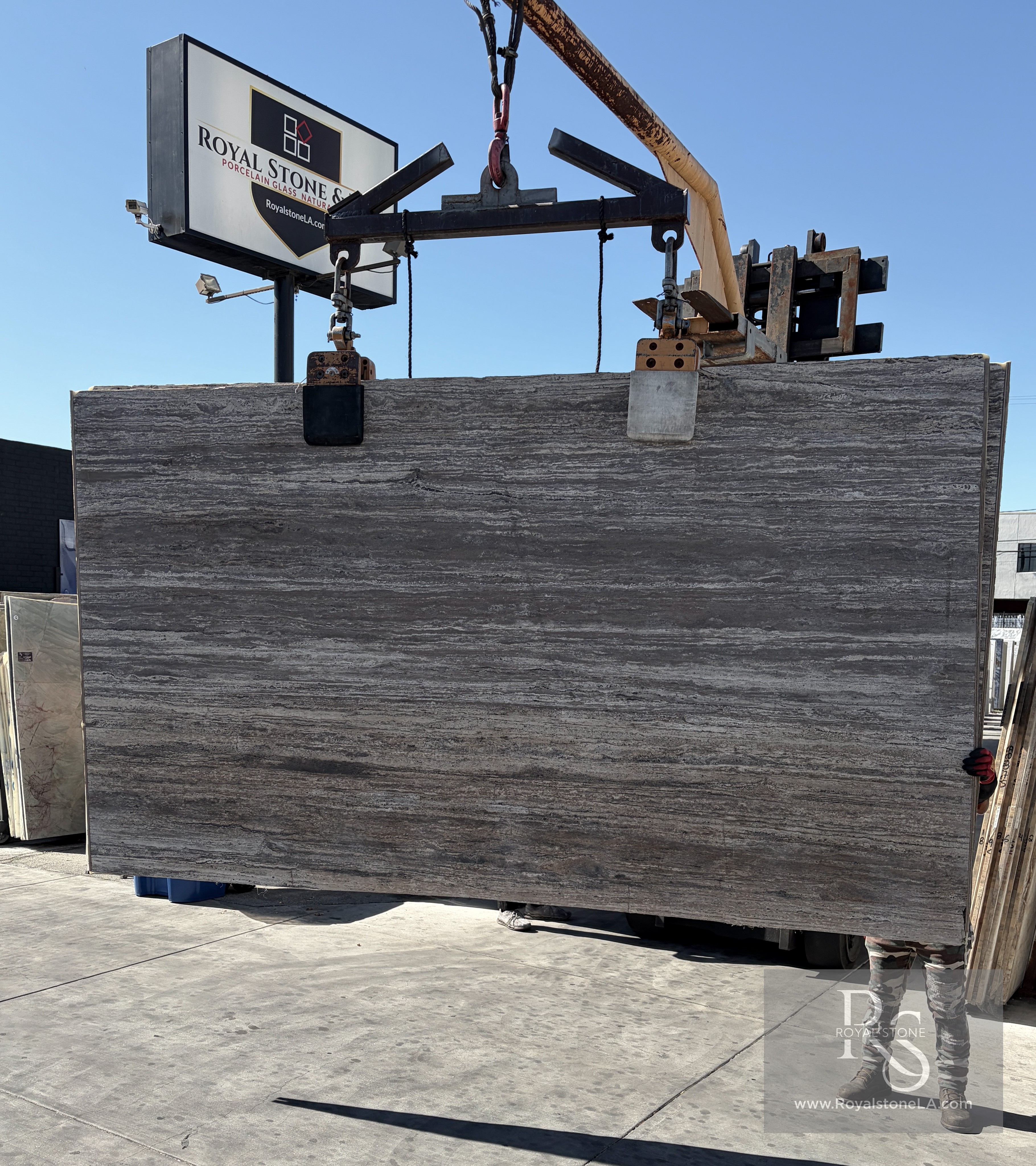 Antolini Breccia Capraia Ultimate YG557 honed marble slab at Royal Stone, white field with burgundy and violet brecciated veining