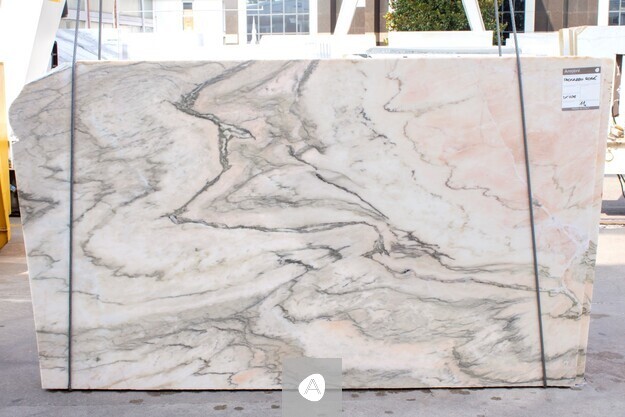 Antolini Paonazzo Rose marble slab with cream field, soft pink wash, and grey-green veining